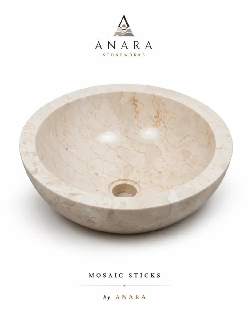 Polished beige marble sink vanity with round bowl and natural veining
